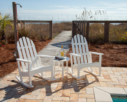 POLYWOOD Classic Adirondack Rocking Chair in White styled outdoors
