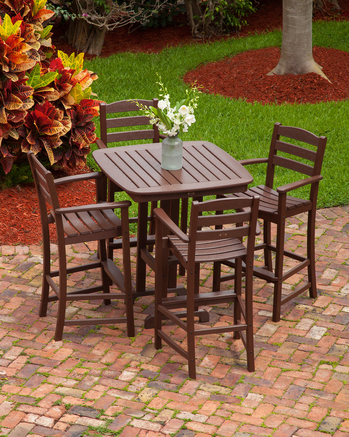 POLYWOOD Lakeside Bar Arm Chair in Mahogany in an outdoor setting
