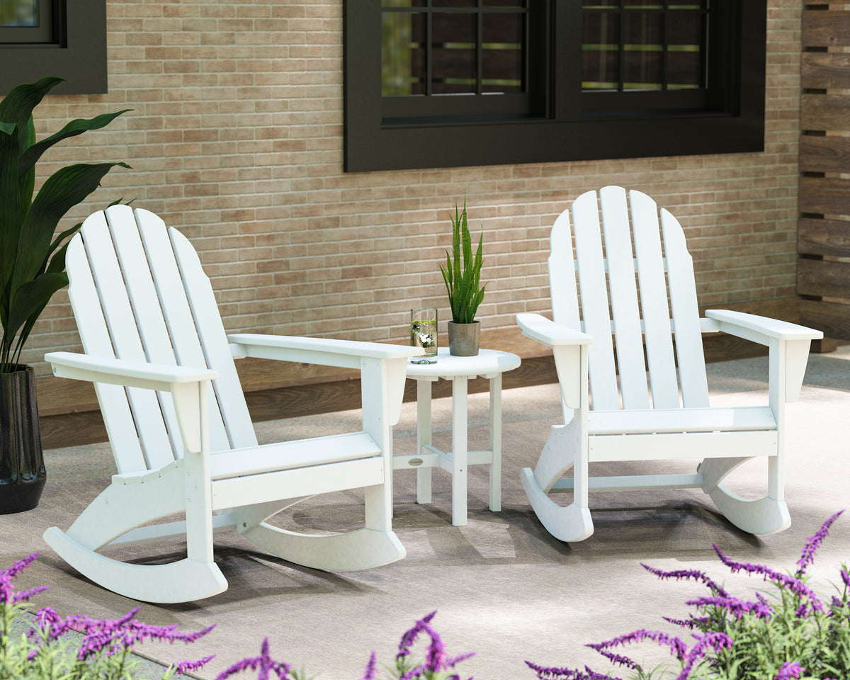 POLYWOOD Vineyard 3-Piece Adirondack Rocking Chair Set with 18" Round Table in White in an outdoor setting