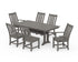 Gray outdoor dining table with six matching chairs on a white background