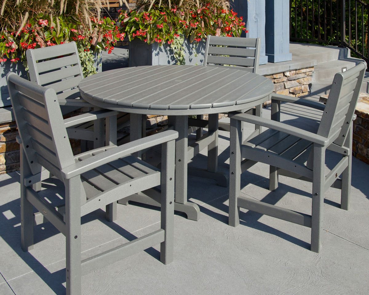 Lifestyle photo of the POLYWOOD 48" Round Farmhouse Dining Table in Slate Grey