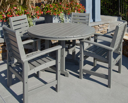 Lifestyle photo of the POLYWOOD 48" Round Farmhouse Dining Table in Slate Grey