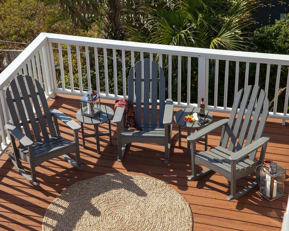 POLYWOOD Classic Adirondack Rocking Chair in Slate Grey styled outdoors