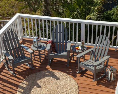 POLYWOOD Classic Adirondack Rocking Chair in Slate Grey styled outdoors