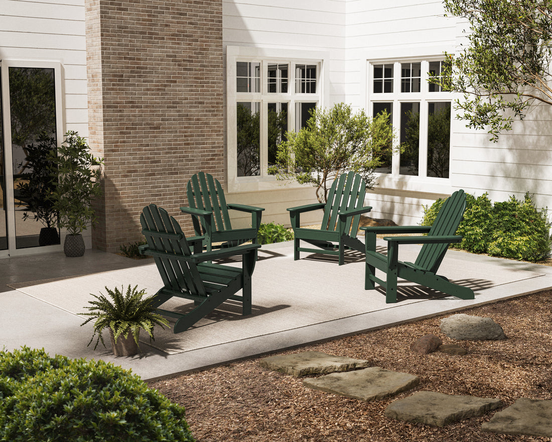 POLYWOOD 4-Piece Classic Adirondack Conversation Set in Green in an outdoor setting