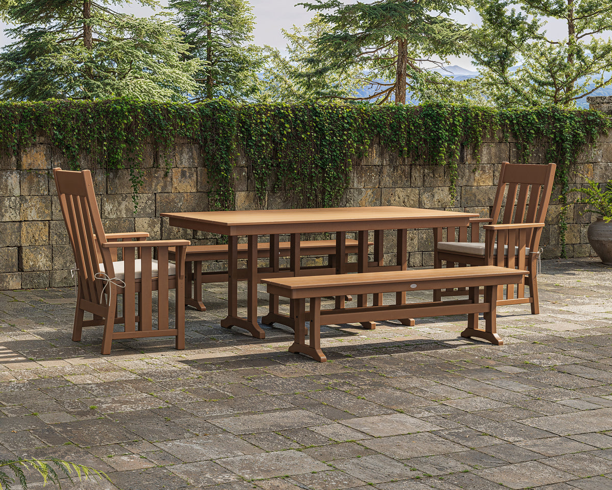 POLYWOOD Acadia 5-Piece Farmhouse Dining Set with Benches in Teak in an outdoor setting