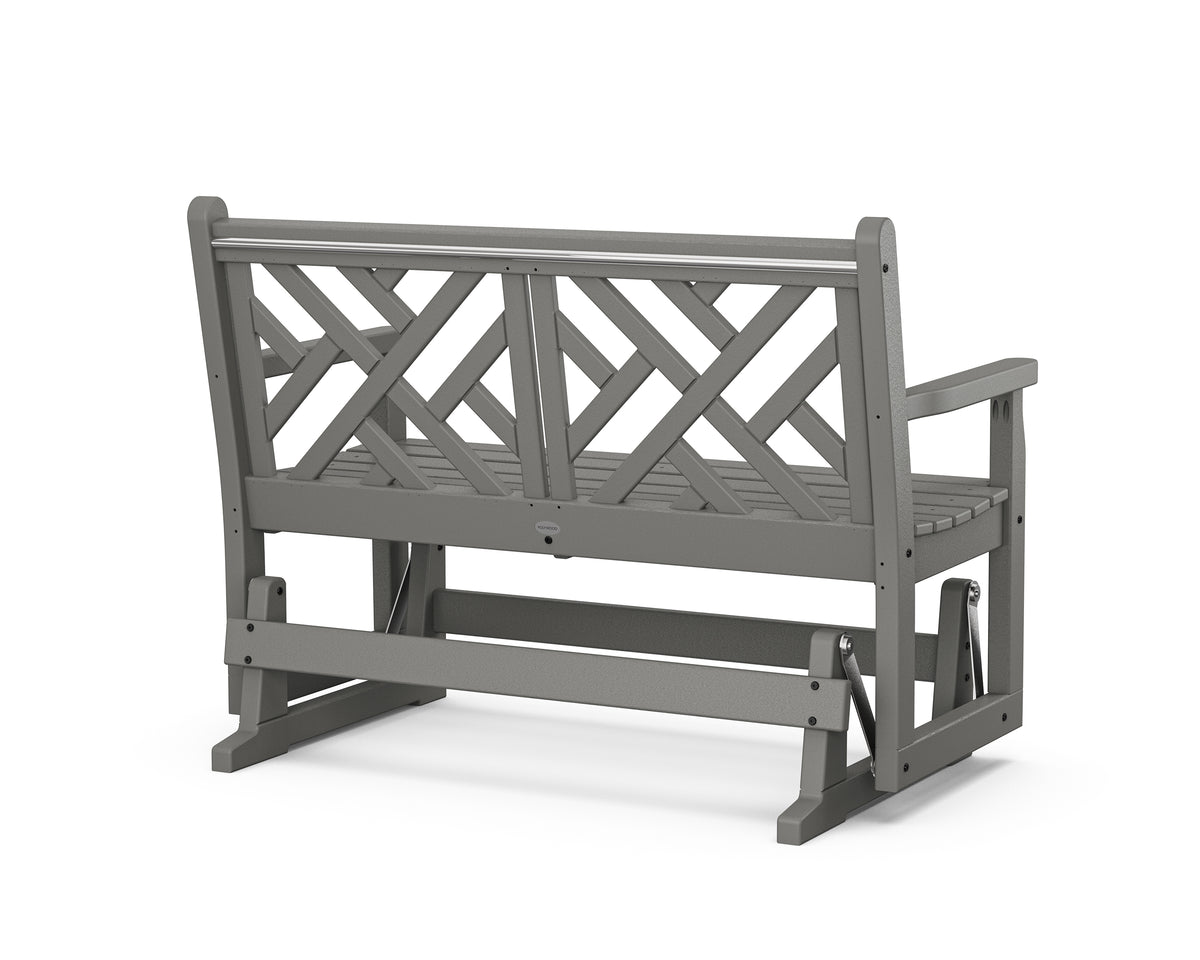 Angled view of the POLYWOOD Chippendale 48" Glider in Slate Grey