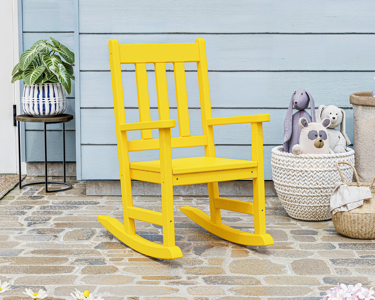 POLYWOOD Kids Vineyard Rocking Chair in Lemon in an outdoor setting