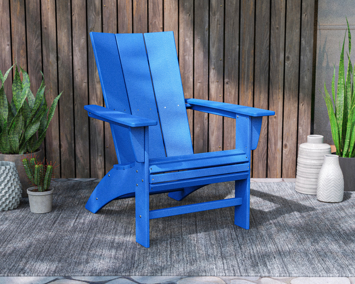 POLYWOOD Modern Curveback Adirondack Chair in Pacific Blue styled outdoors