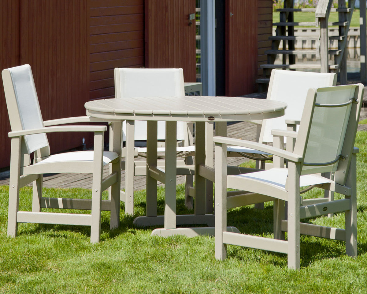 POLYWOOD 48" Round Farmhouse Dining Table in an outdoor setting