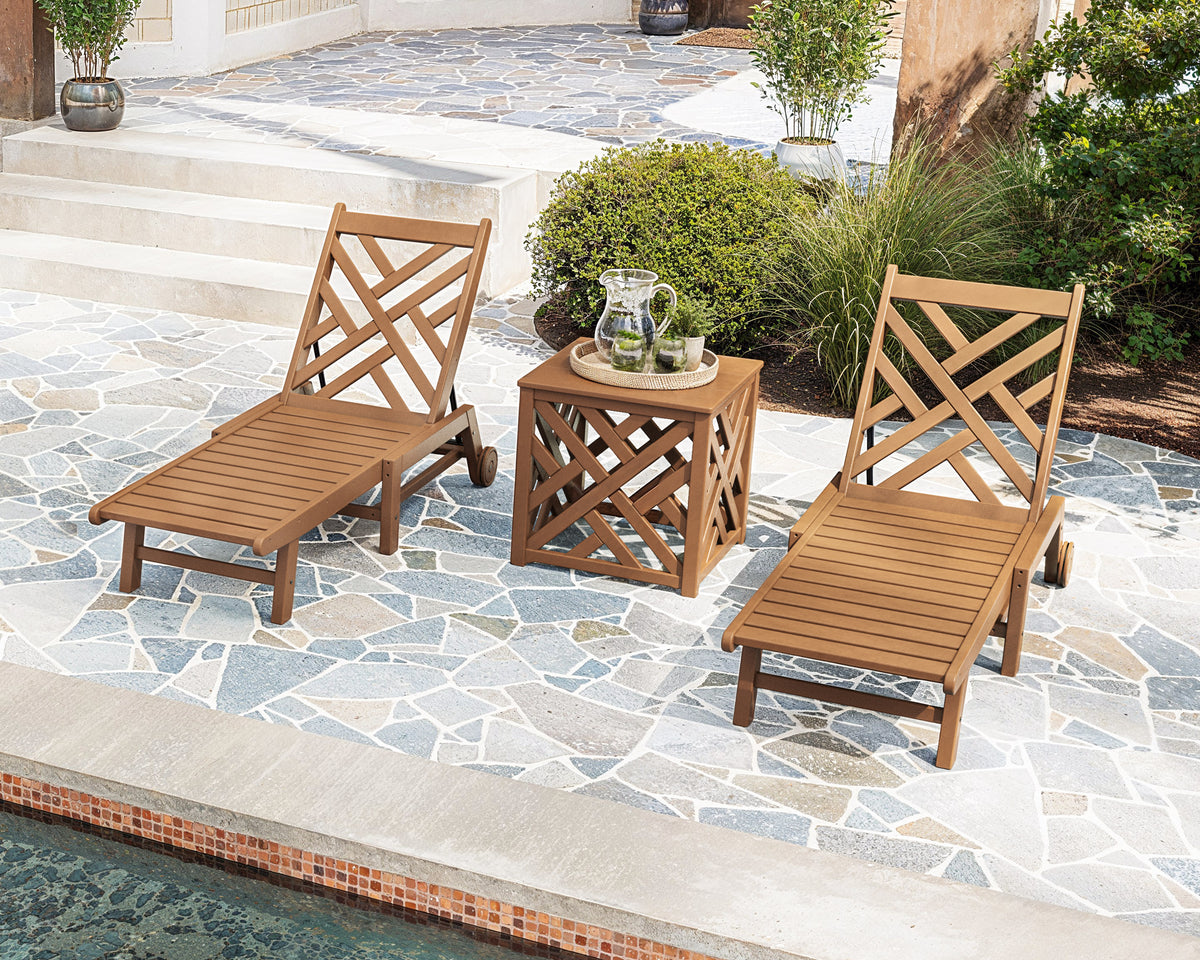 POLYWOOD Chippendale 3-Piece Chaise Set with Wheels and Umbrella Stand Accent Table in an outdoor setting