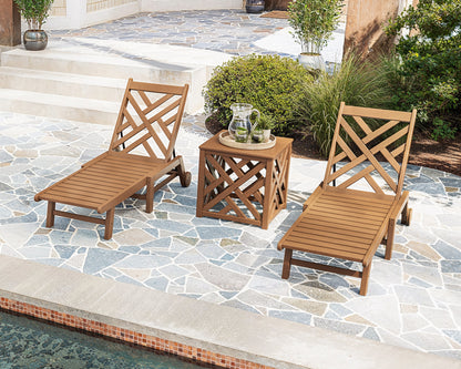 POLYWOOD Chippendale 3-Piece Chaise Set with Wheels and Umbrella Stand Accent Table in an outdoor setting