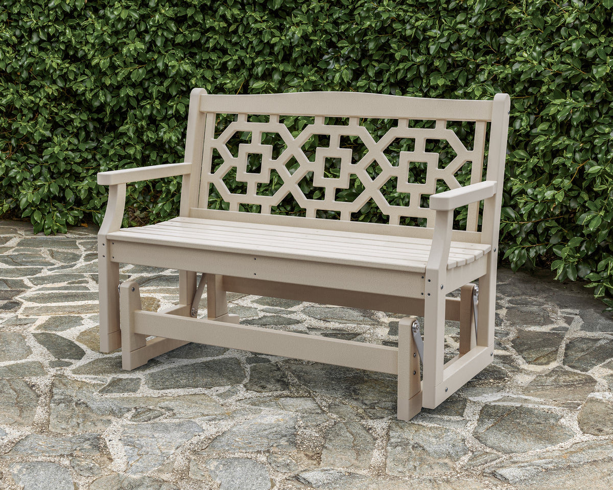 POLYWOOD Chinoiserie 48" Glider in Sand in an outdoor setting