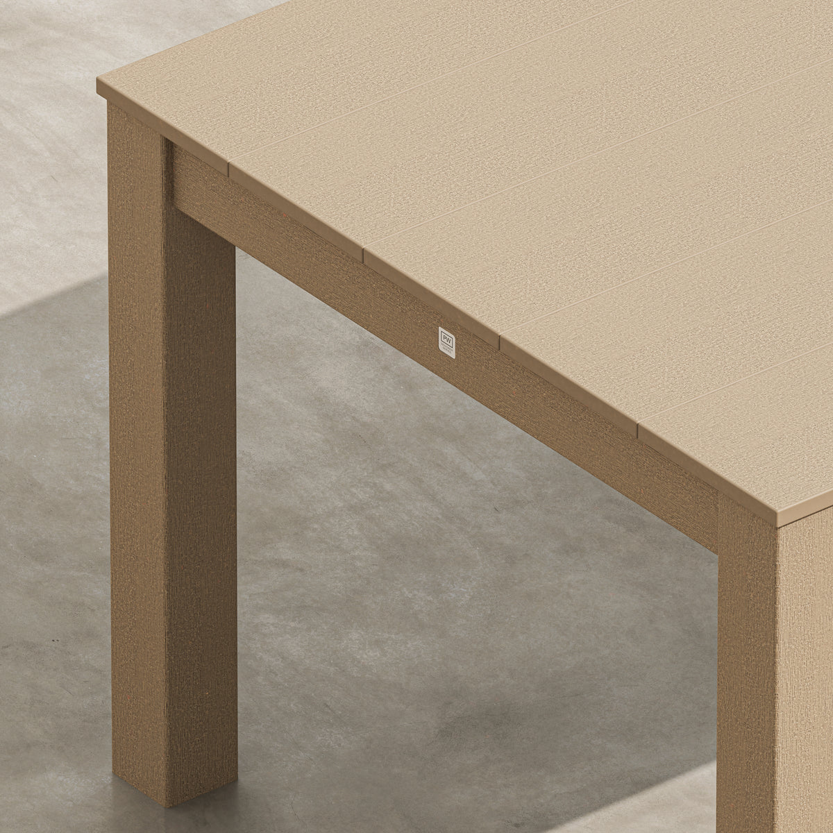Angled view of the POLYWOOD 84" Parsons Dining Table in Vintage Sahara
