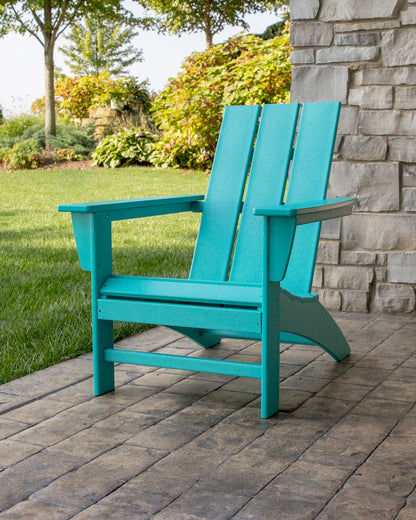 Lifestyle photo of the POLYWOOD Modern Adirondack Chair in Aruba