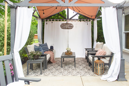 POLYWOOD Vineyard 4-Piece Deep Seating Set with Two Chairs and Loveseat in an outdoor setting