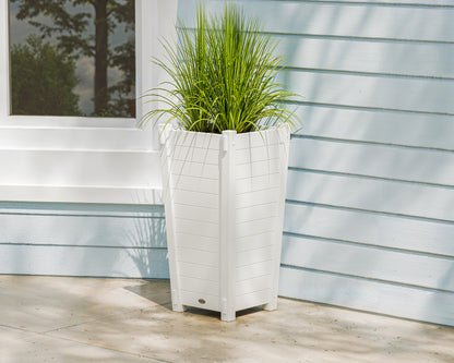 POLYWOOD Nautical Tapered Square Planter Box in White in an outdoor setting