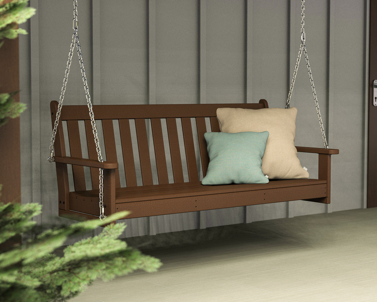 Lifestyle photo of the POLYWOOD Vineyard 60" Porch Swing in Teak