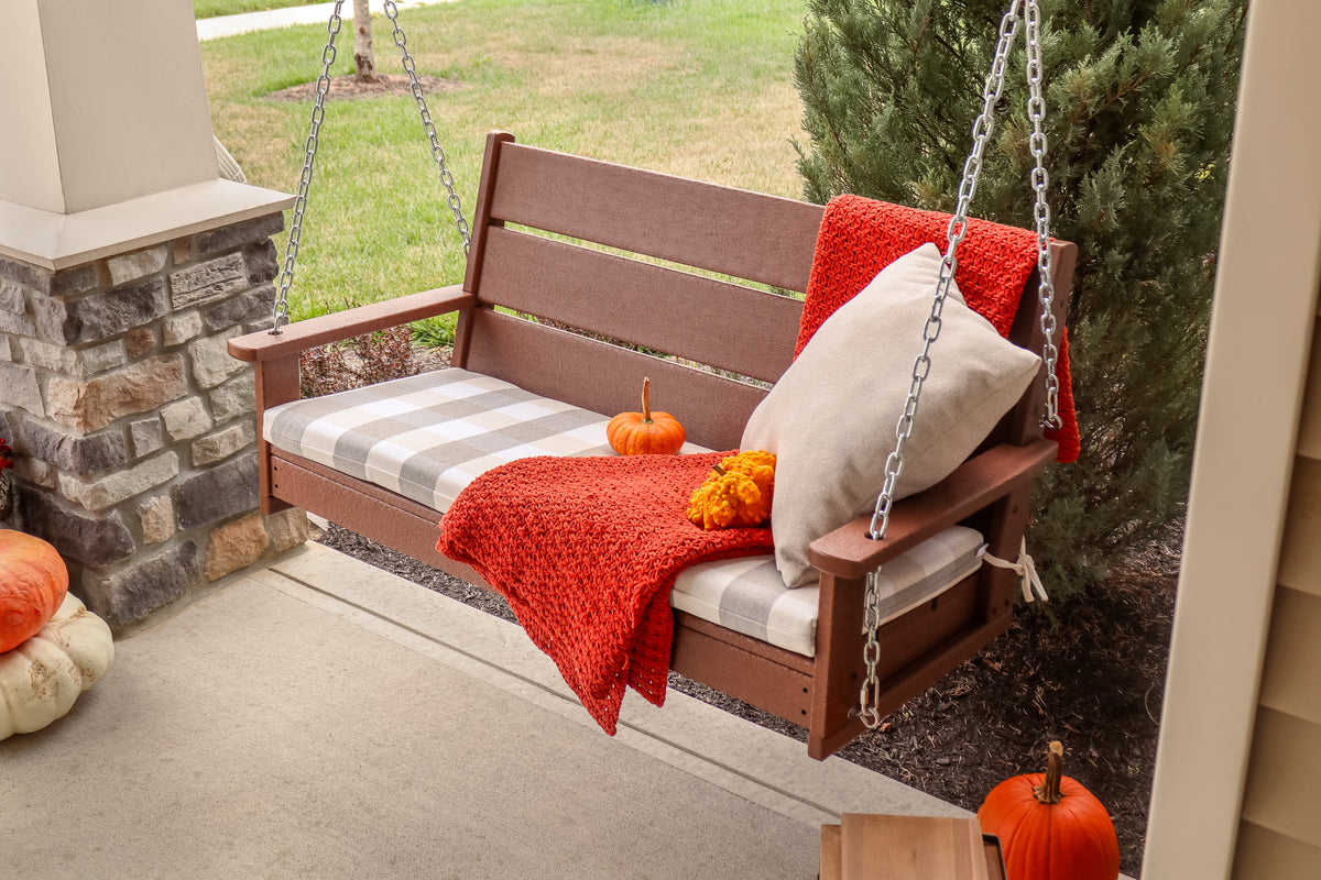 POLYWOOD Lakeside 48" Swing in Teak in an outdoor setting