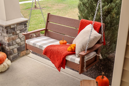 POLYWOOD Lakeside 48" Swing in Teak in an outdoor setting