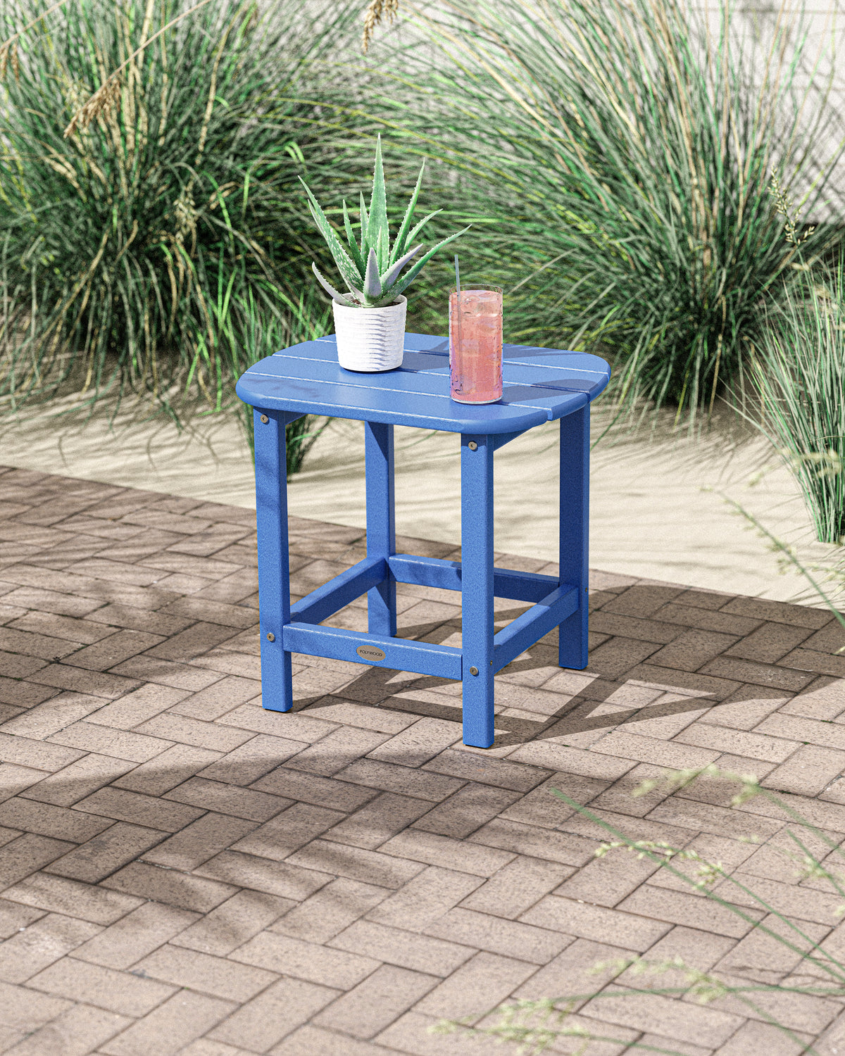 Lifestyle photo of the POLYWOOD South Beach 18" Side Table in Pacific Blue