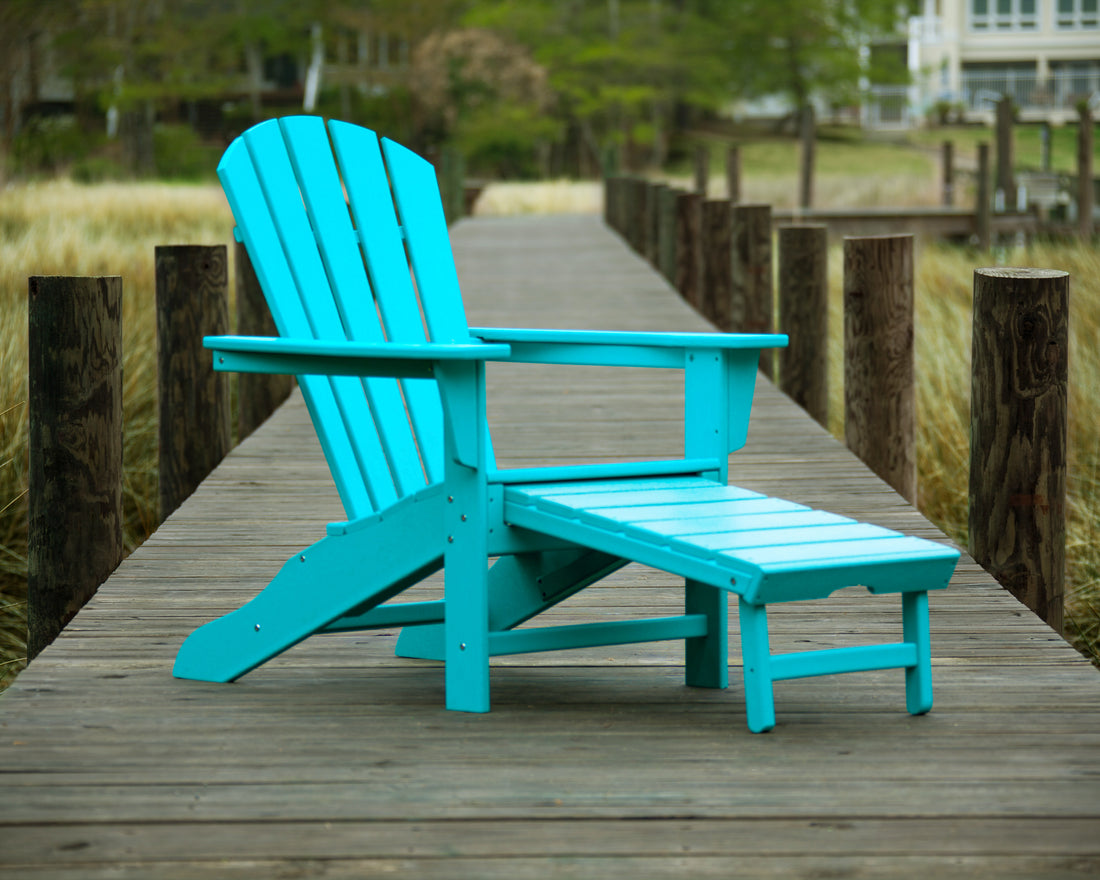 POLYWOOD Palm Coast Ultimate Adirondack with Hideaway Ottoman in Aruba in an outdoor setting