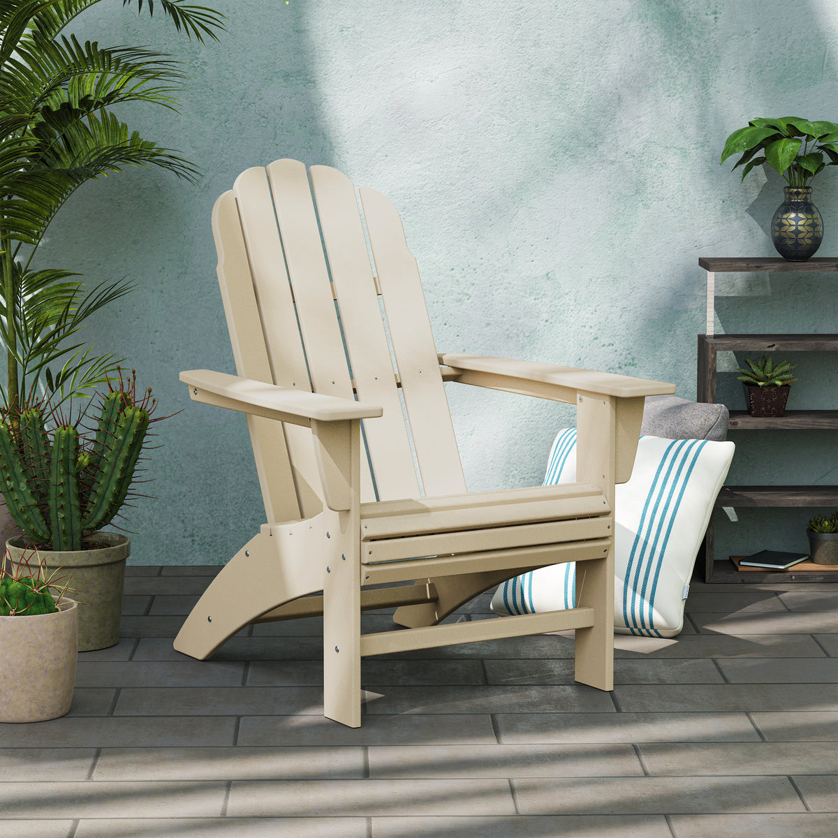Lifestyle photo of the POLYWOOD Vineyard Curveback Adirondack Chair in Sand