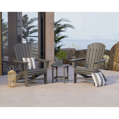 Two Adirondack chairs with striped cushions on a patio, accompanied by a small table and lantern.