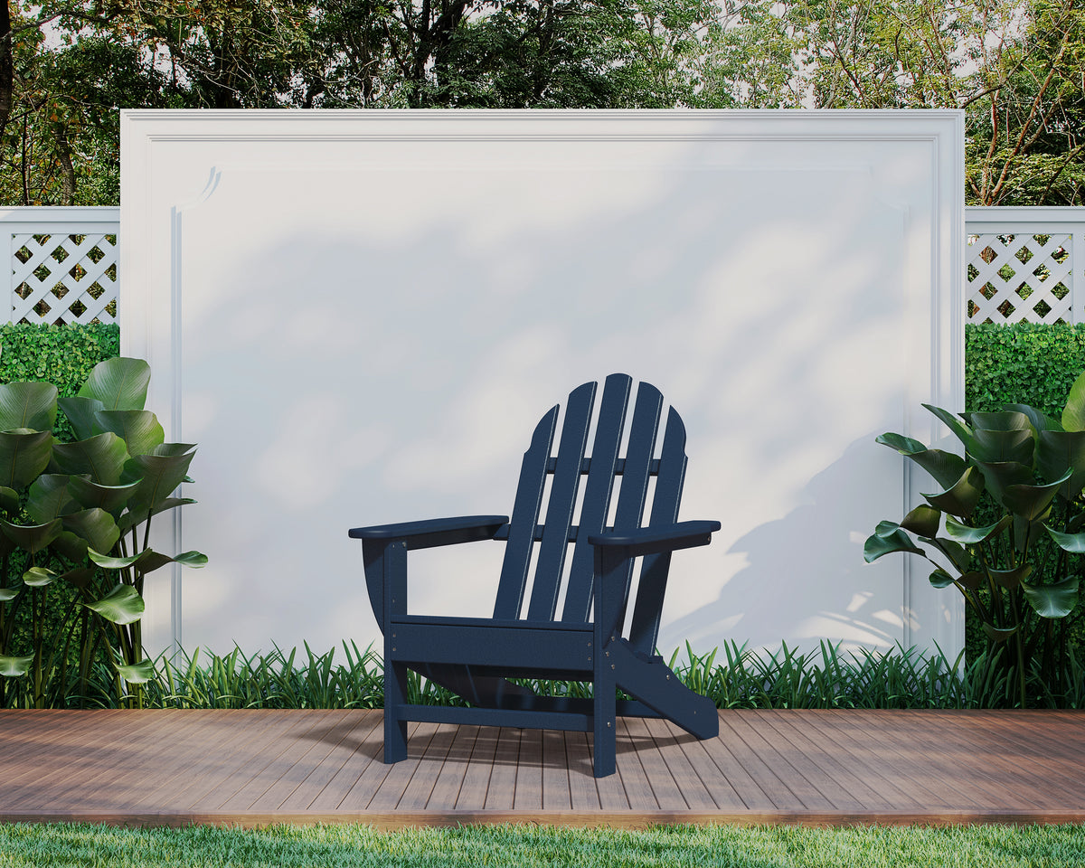 POLYWOOD Classic Adirondack Chair in Navy in an outdoor setting