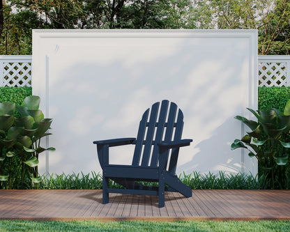 POLYWOOD Classic Adirondack Chair in Navy in an outdoor setting
