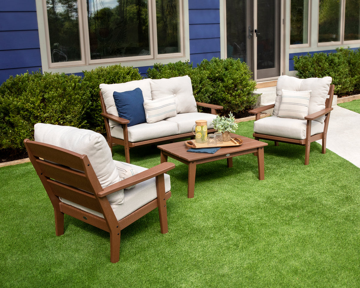 Lifestyle photo of the POLYWOOD Lakeside Coffee Table in Teak