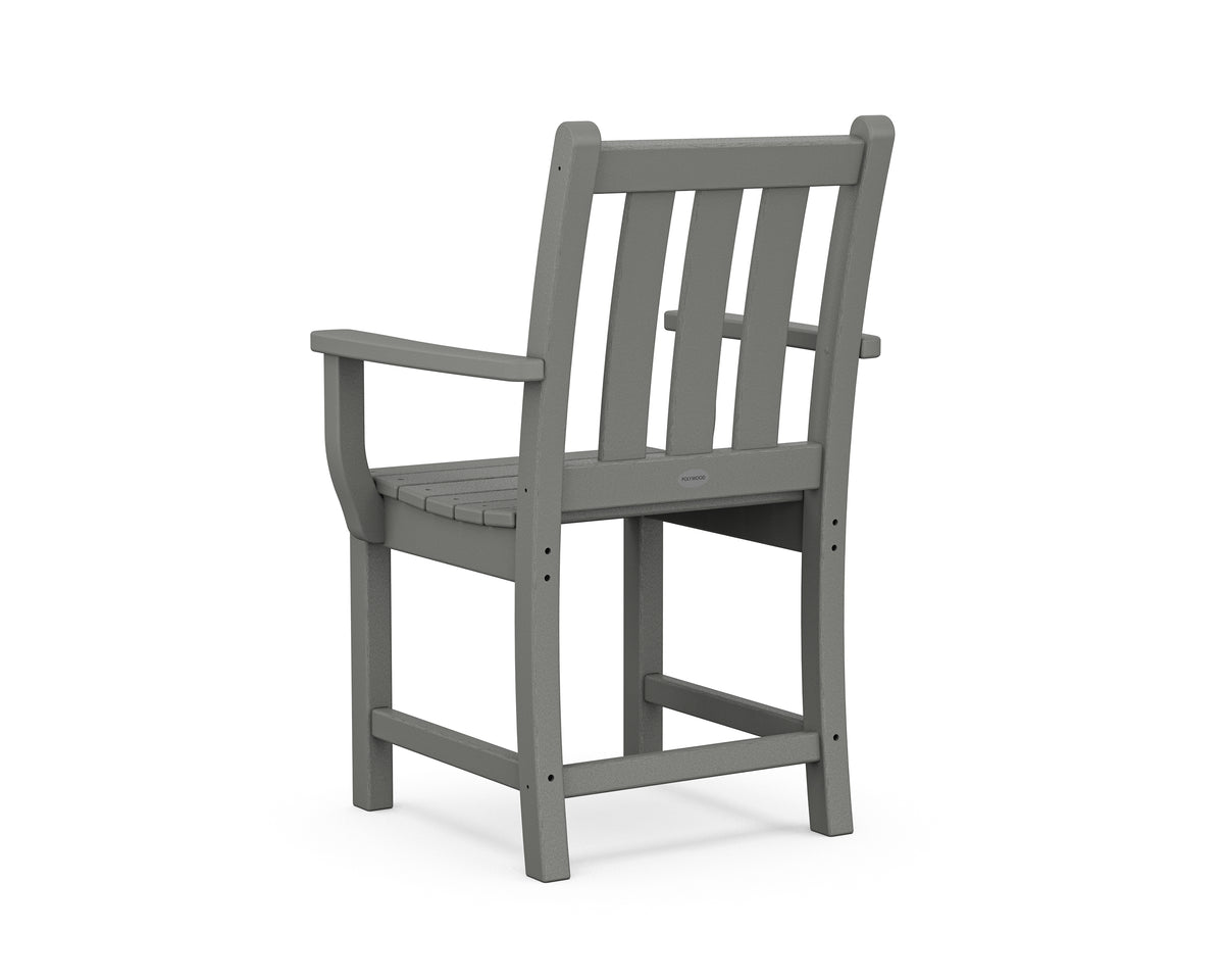 Angled view of the POLYWOOD Traditional Garden Dining Arm Chair in Slate Grey