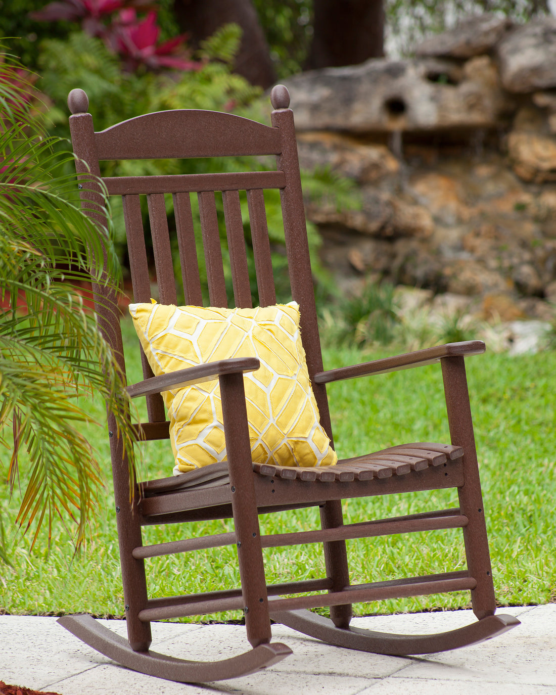 POLYWOOD Jefferson Rocking Chair in Mahogany in an outdoor setting