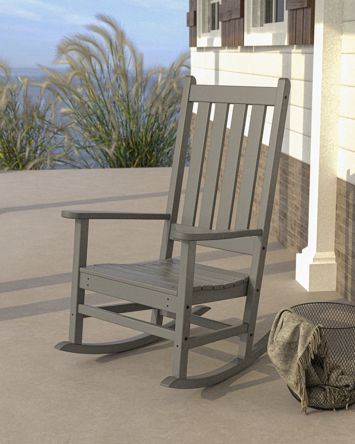 POLYWOOD Vineyard Porch Rocking Chair in Slate Grey styled outdoors