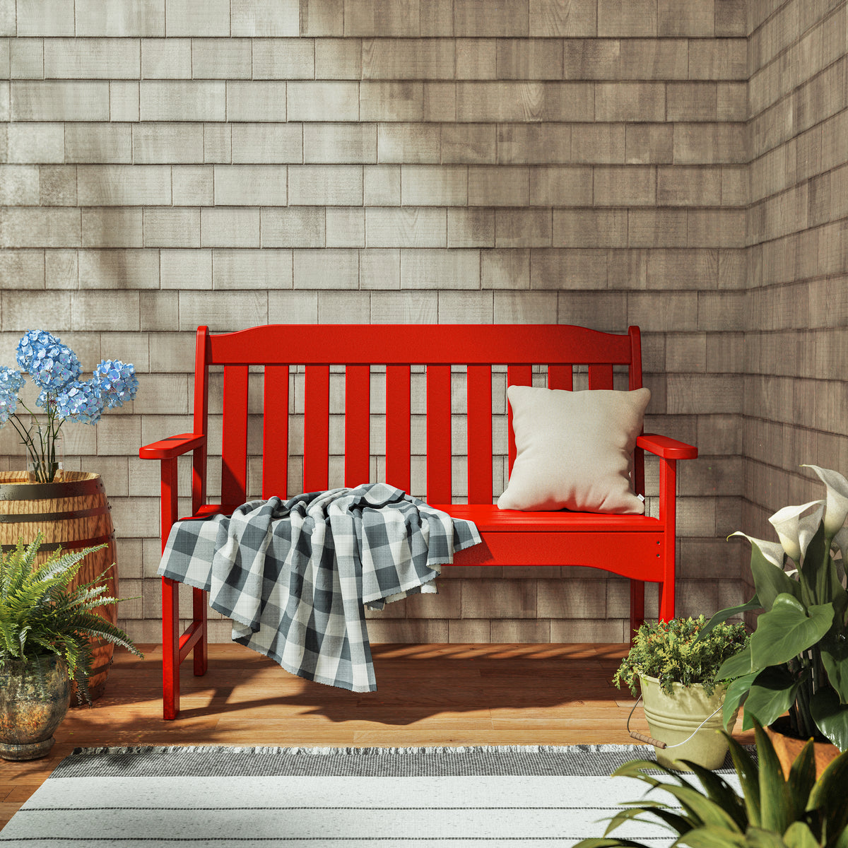 Lifestyle photo of the POLYWOOD Country Living 48" Garden Bench in Sunset Red