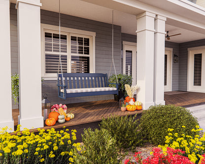 POLYWOOD Country Living 60" Swing in Navy in an outdoor setting