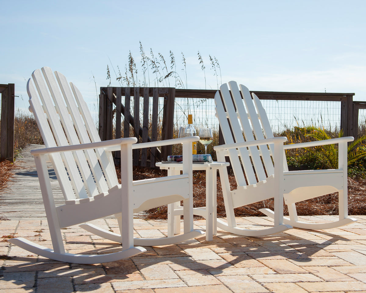 Lifestyle photo of the POLYWOOD Classic Adirondack Rocking Chair in White