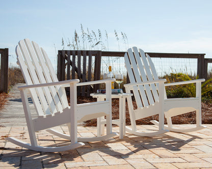 Lifestyle photo of the POLYWOOD Classic Adirondack Rocking Chair in White