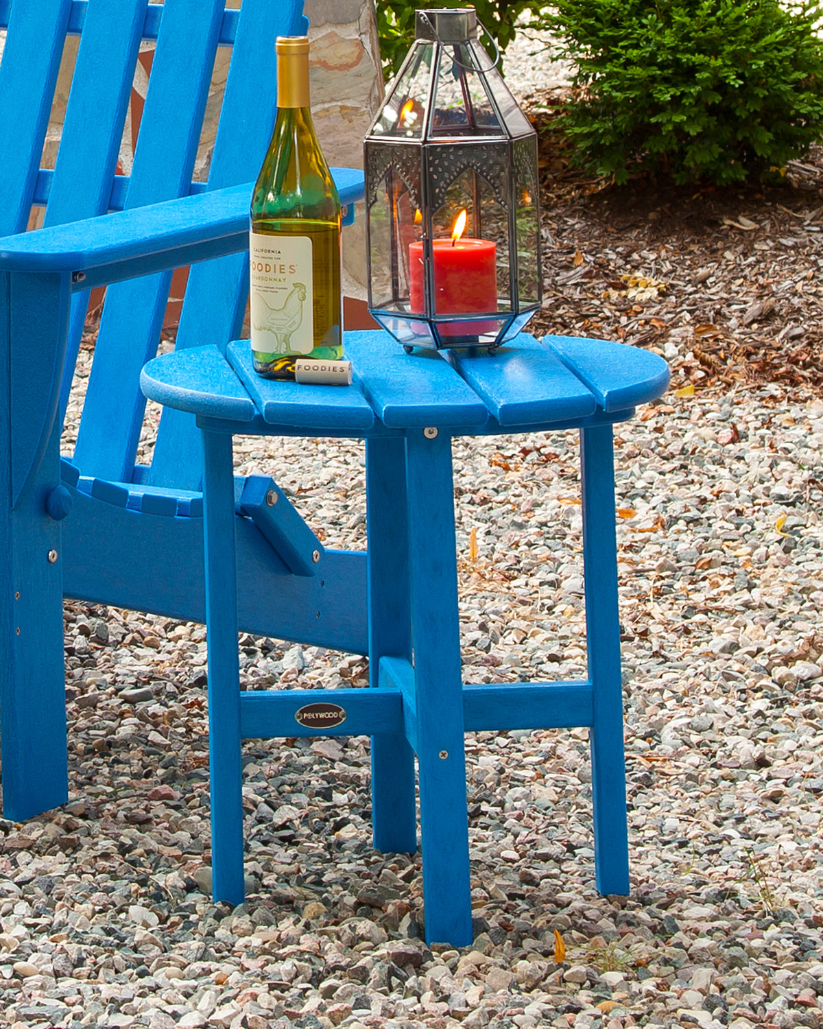 Lifestyle photo of the POLYWOOD Round 18" Side Table in Pacific Blue