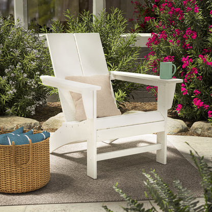 POLYWOOD Cottage Modern Adirondack Chair in White in an outdoor setting