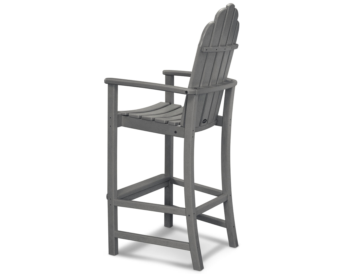 Angled view of the POLYWOOD Classic Adirondack Bar Chair in Slate Grey