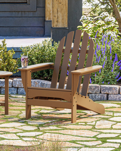 POLYWOOD Classic Adirondack Chair in Teak styled outdoors