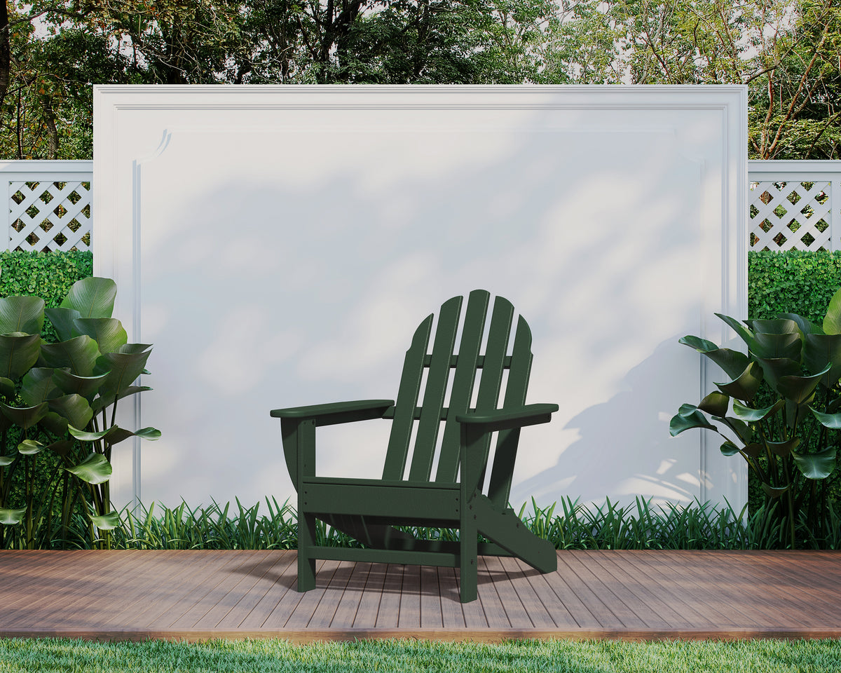 POLYWOOD Classic Adirondack Chair in Green in an outdoor setting (2)
