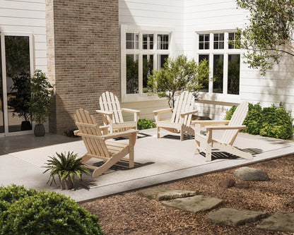 Lifestyle photo of the POLYWOOD 4-Piece Classic Adirondack Conversation Set in Sand