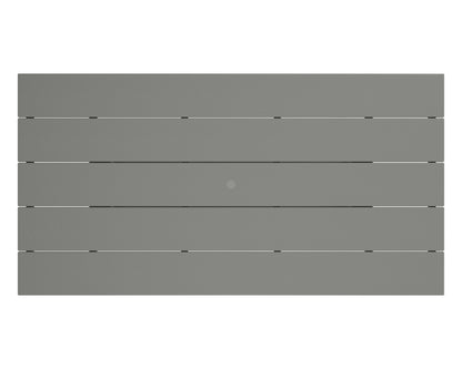 Angled view of the POLYWOOD Farmhouse 37" x 72" Trestle Dining Table from the set in Slate Grey