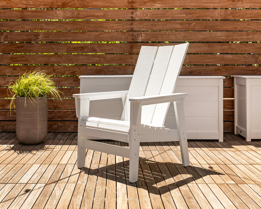 POLYWOOD Modern Grand Upright Adirondack Chair in White in an outdoor setting