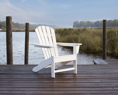 POLYWOOD Palm Coast Adirondack Chair in White in an outdoor setting