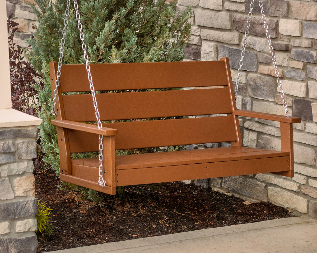 Lifestyle photo of the POLYWOOD Lakeside 48" Swing in Teak