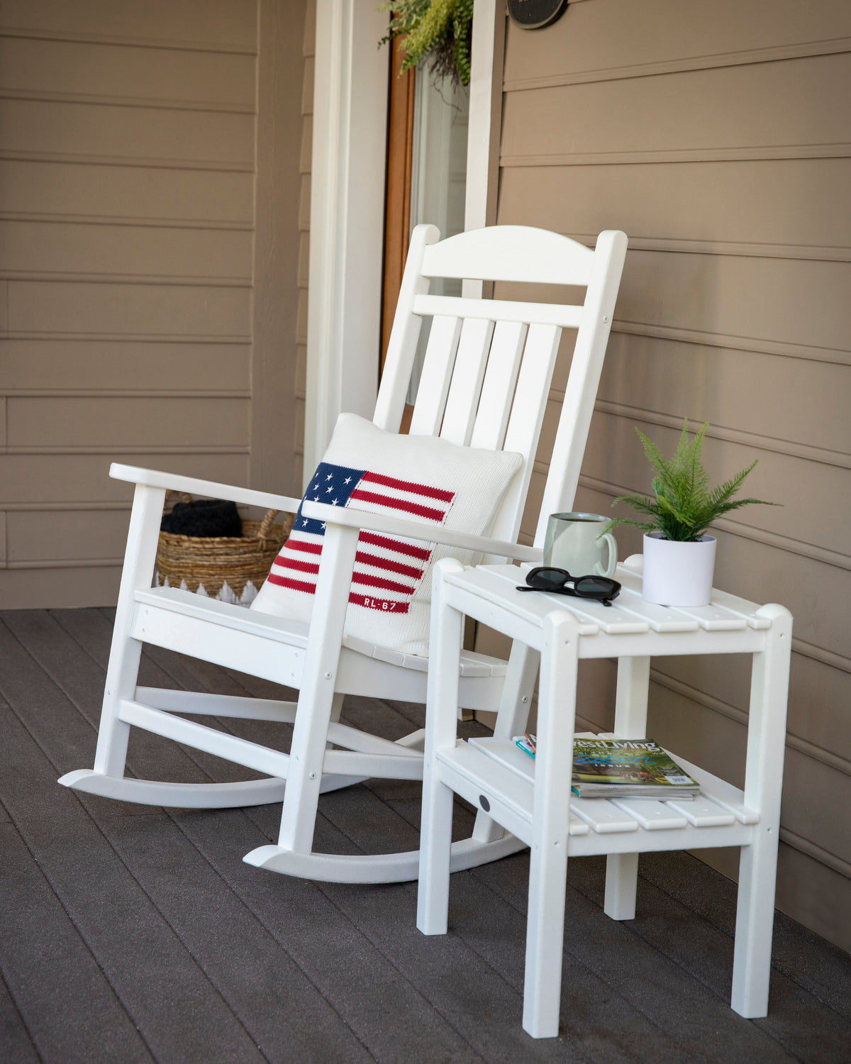 POLYWOOD Two Shelf Side Table in White in an outdoor setting