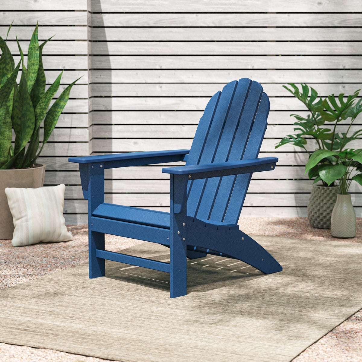 POLYWOOD Vineyard Adirondack Chair in Navy in an outdoor setting